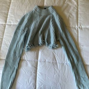 Cropped, blue sweater